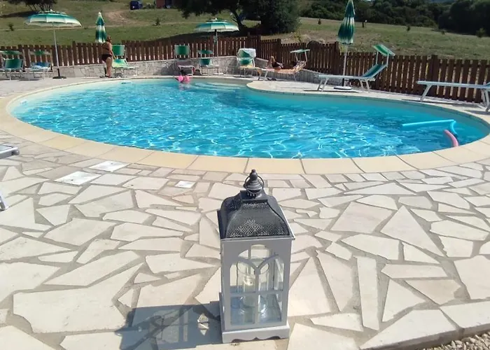 Apartment Gli Olivastri: Sea View With Pool And Wi-fi Aglientu
